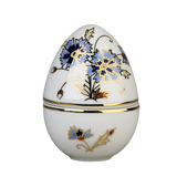 Zsolnay Cornflower porcelain egg-shaped bonbonier featuring hand-painted blue flowers and 18K gold details.