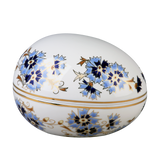 Zsolnay Cornflower porcelain round bonbonnier featuring hand-painted blue flowers and 18K gold details.